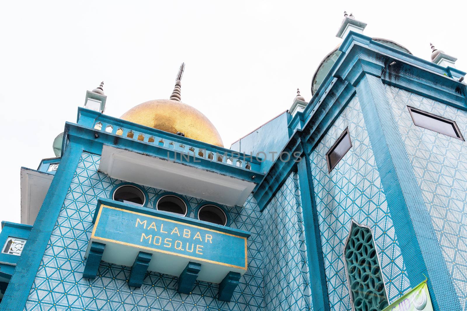 Low angle view of the blue Malabar Mosque in Singapore