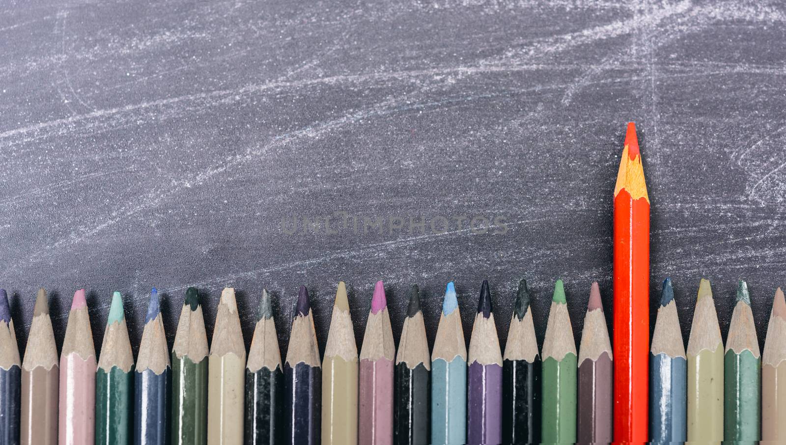 Red pencils color standing out from the crowd by Sorapop