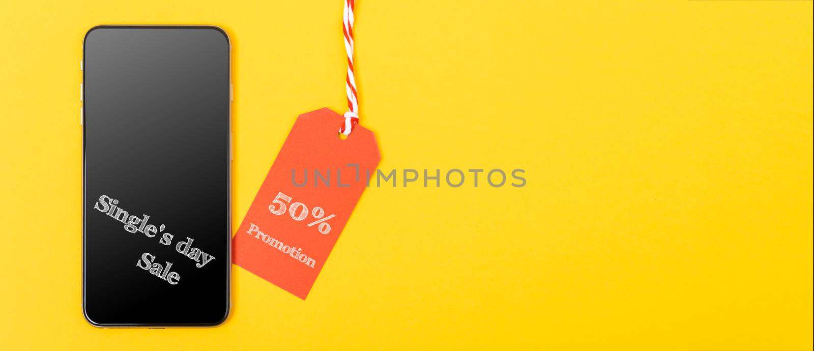 Internet Online shopping,  Single's day sale text red tag and Smartphone blank screen on yellow background