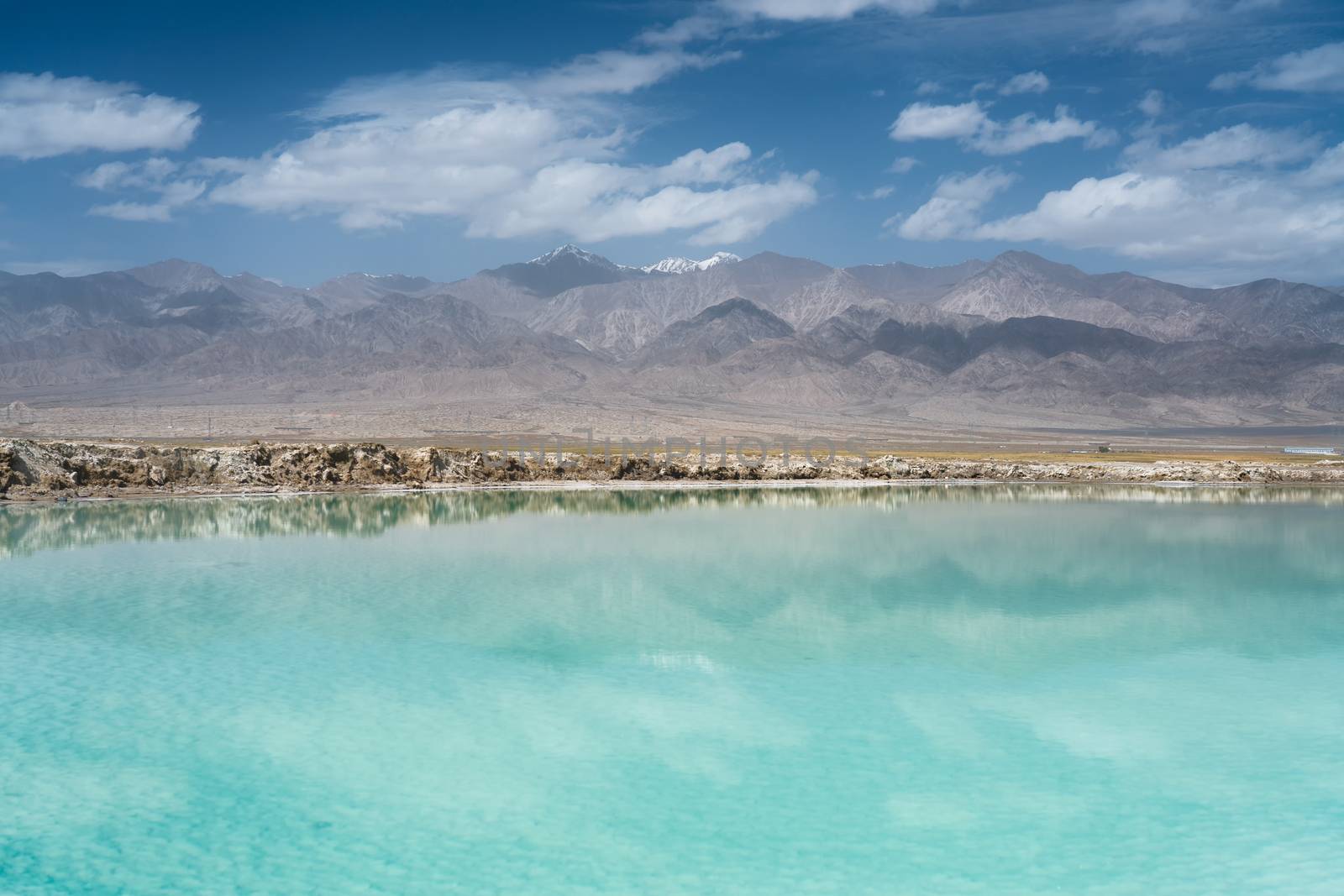 Salt lake and mountains, natural scenery. Photo in Qinghai, China.