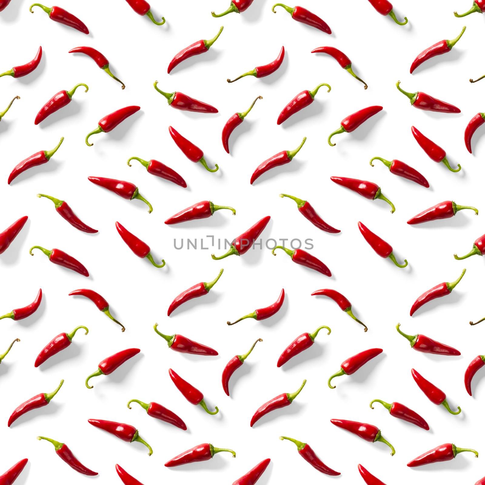 Seamless pattern made of red chili or chilli on white background. Minimal food pattern. Red hot chilli seamless peppers pattern. Food background. by PhotoTime