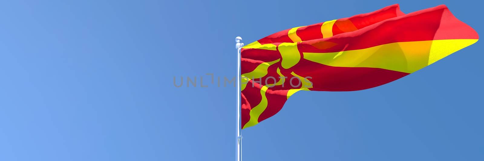 3D rendering of the national flag of Macedonia waving in the wind against a blue sky