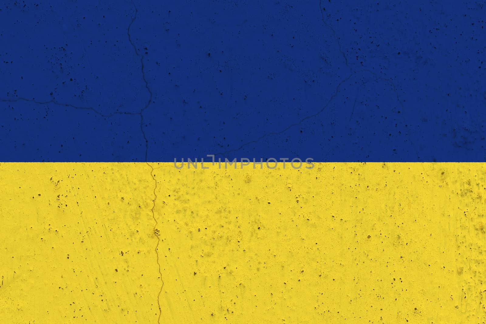 Ukraine flag on concrete wall. Patriotic grunge background. National flag of Ukraine
