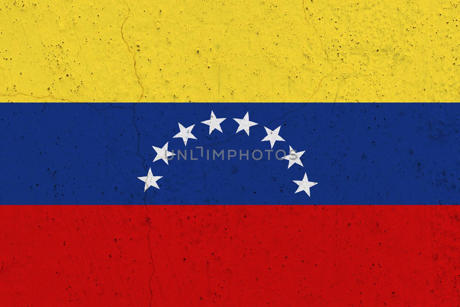 Venezuela flag on concrete wall. Patriotic grunge background. National flag of Venezuela