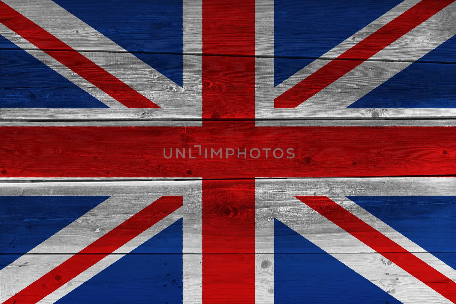 United Kingdom flag painted on old wood plank. Patriotic background. National flag of United Kingdom