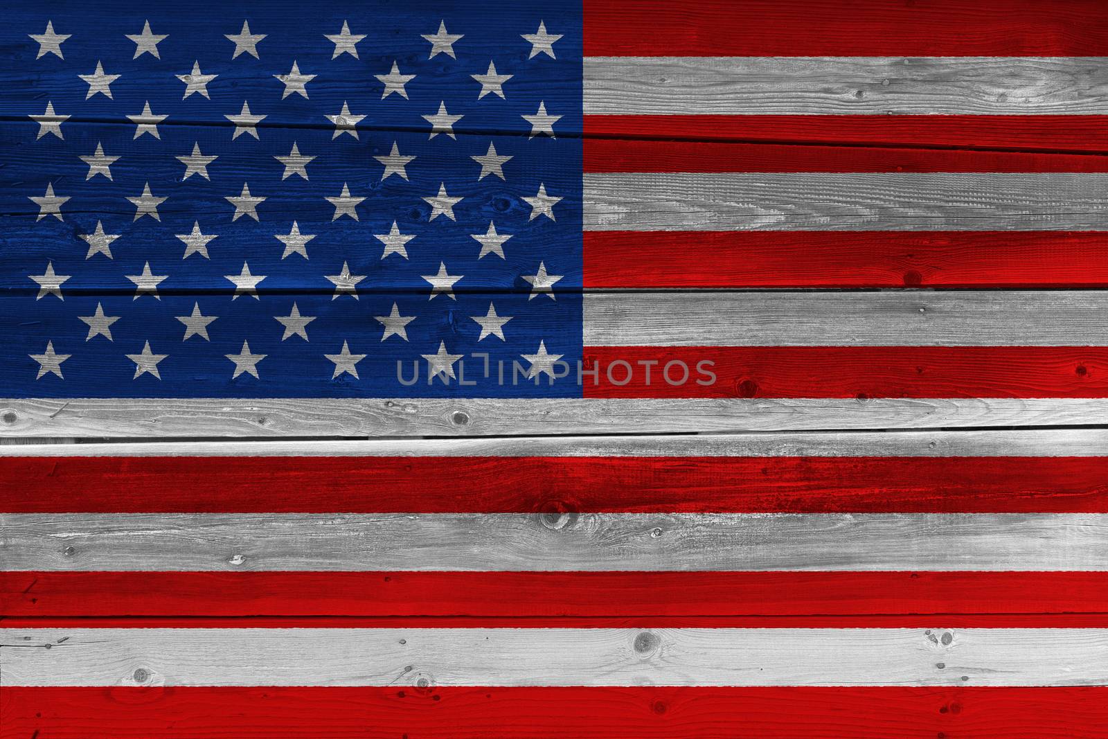 United States of America flag painted on old wood plank. Patriotic background. National flag of United States of America