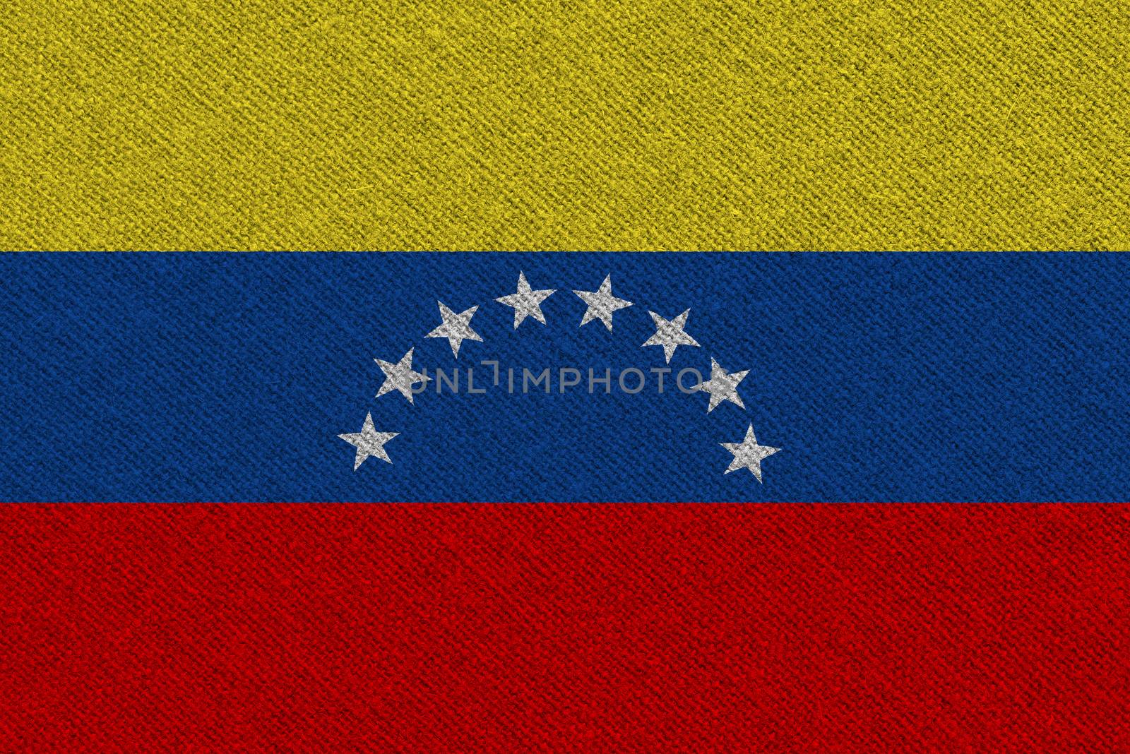 Venezuela fabric flag. Patriotic background. National flag of Venezuela