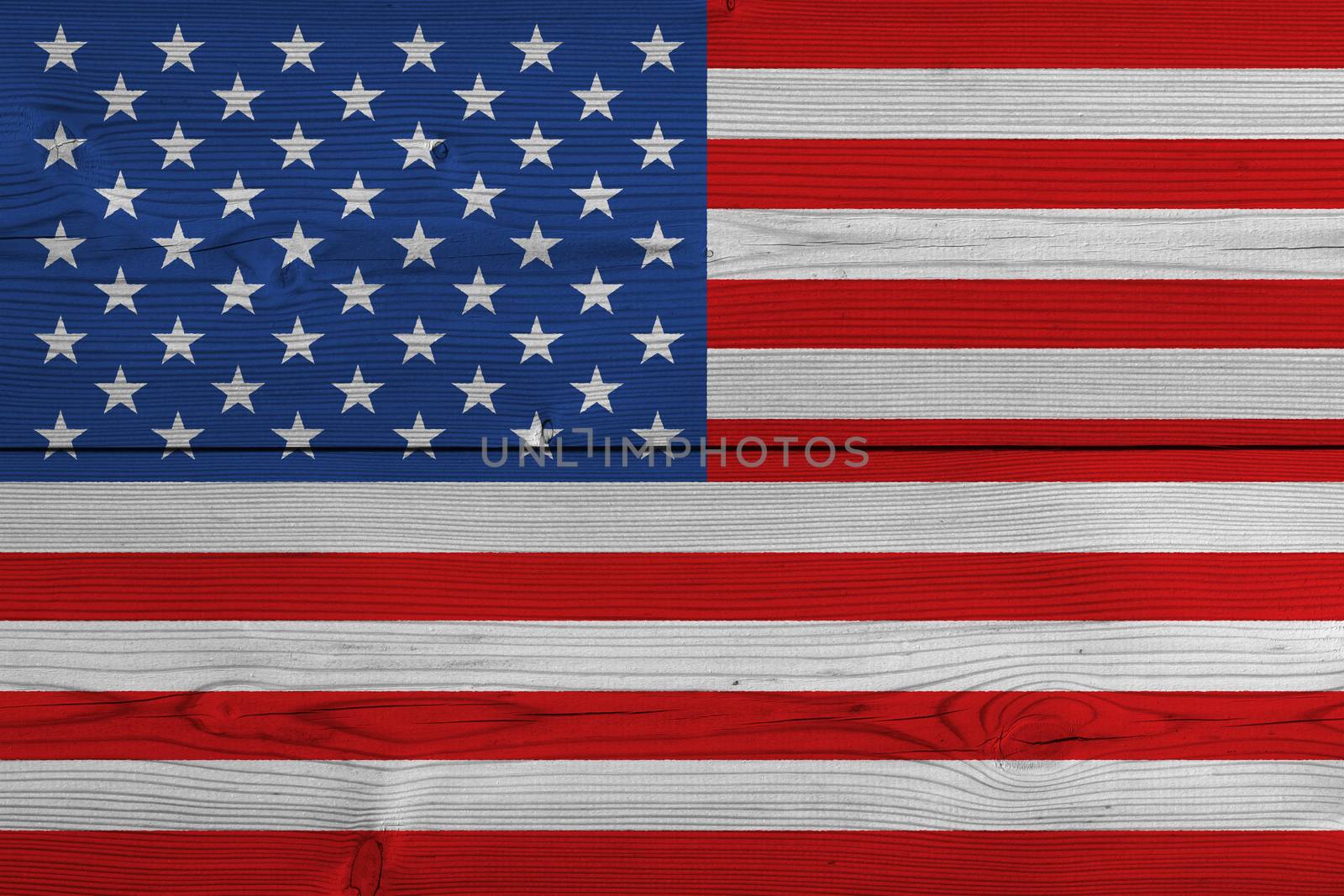 United States of America flag painted on old wood plank. Patriotic background. National flag of United States of America