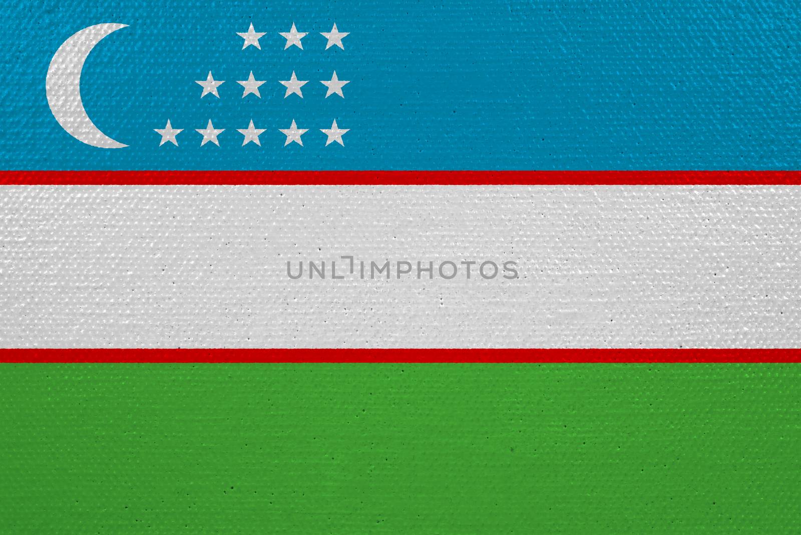 Uzbekistan flag on canvas. Patriotic background. National flag of Uzbekistan