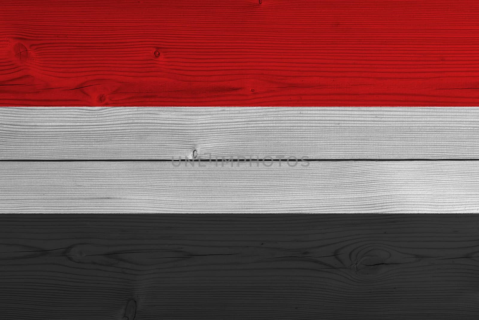 yemen flag painted on old wood plank by Visual-Content