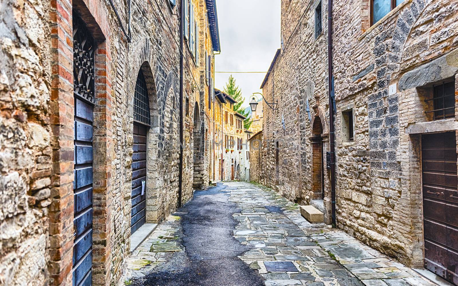 Scenic streets of the medieval town of Gubbio, Umbria, Italy by marcorubino