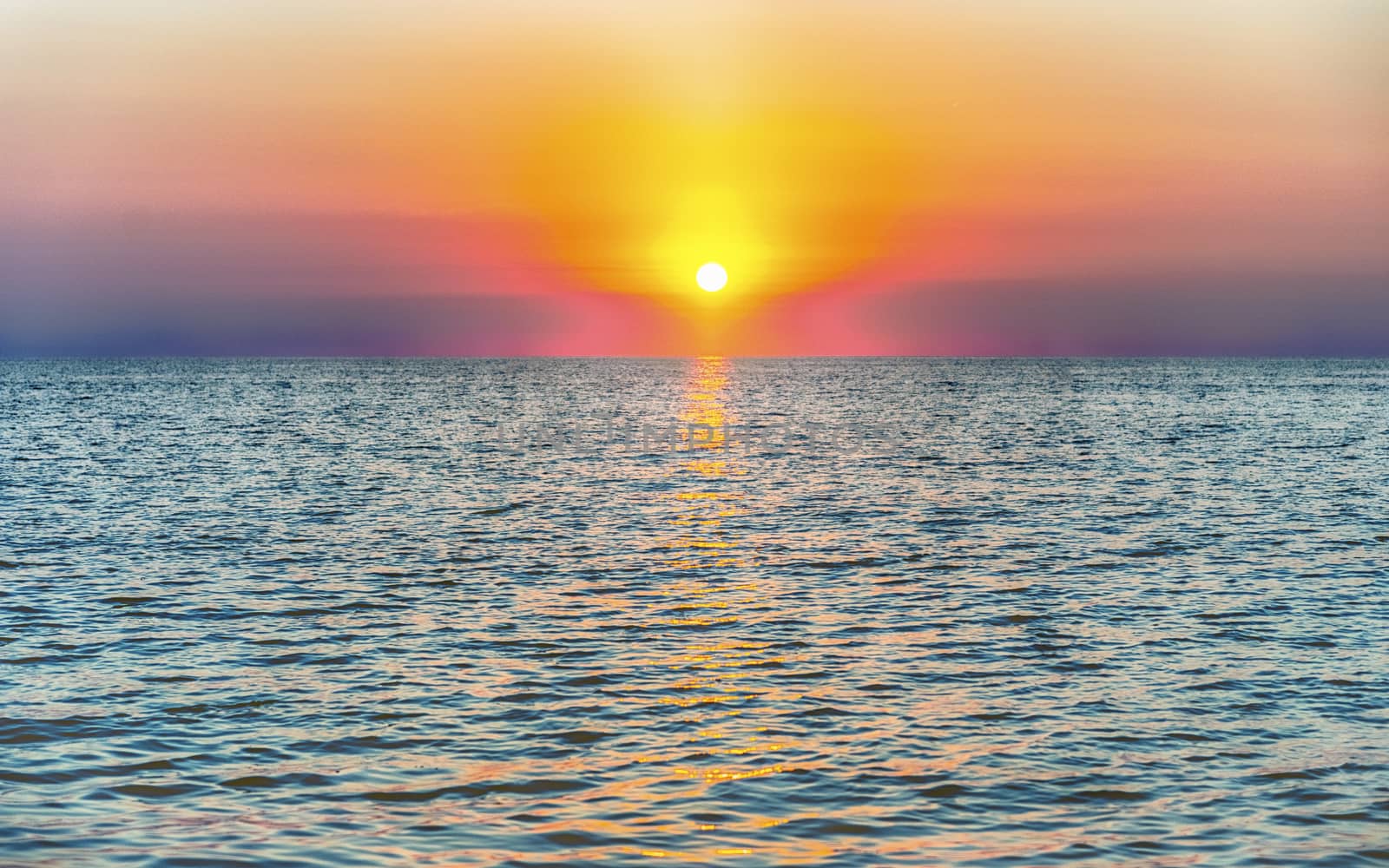 Scenic sunset on the mediterranean sea by marcorubino