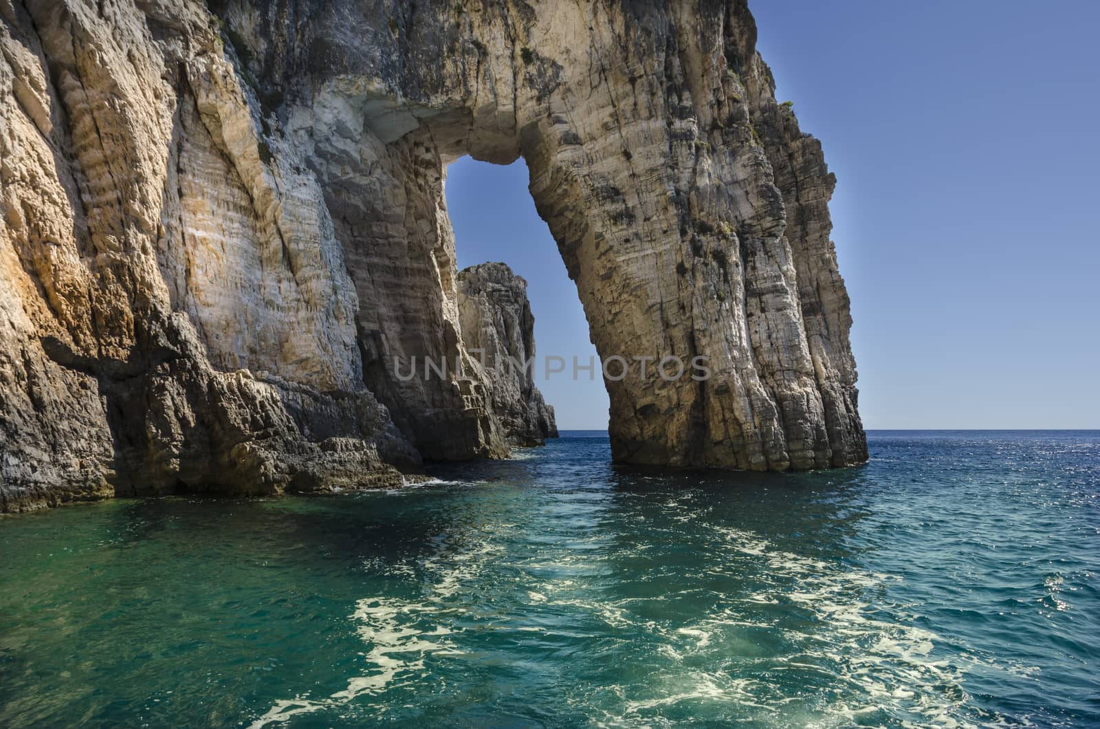cliffs rocks and clear sea on the island of zakynthos or zante