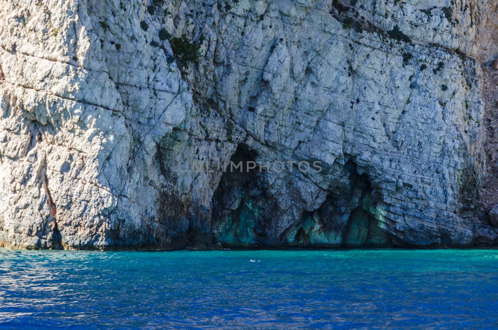 Reflections of the sea on the walls of caves on the shores of the island of Zakynthos in the Ionian Sea