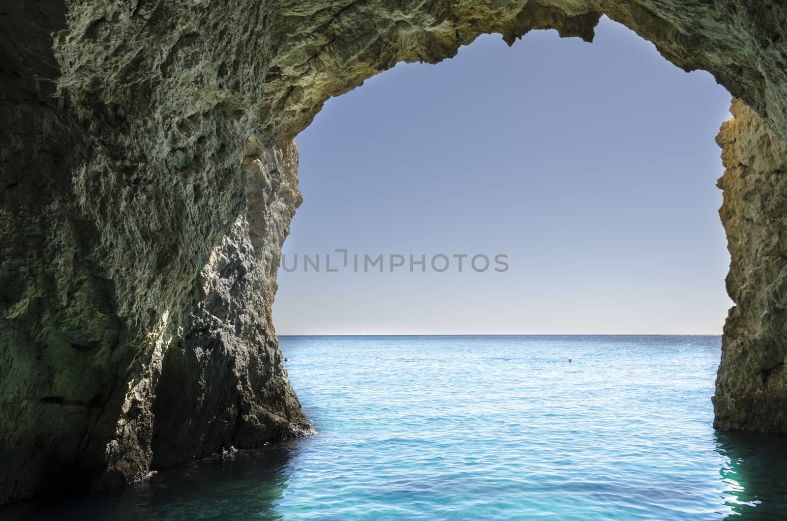 view from inside a cave on the shores of zakynthos island in the Ionian sea