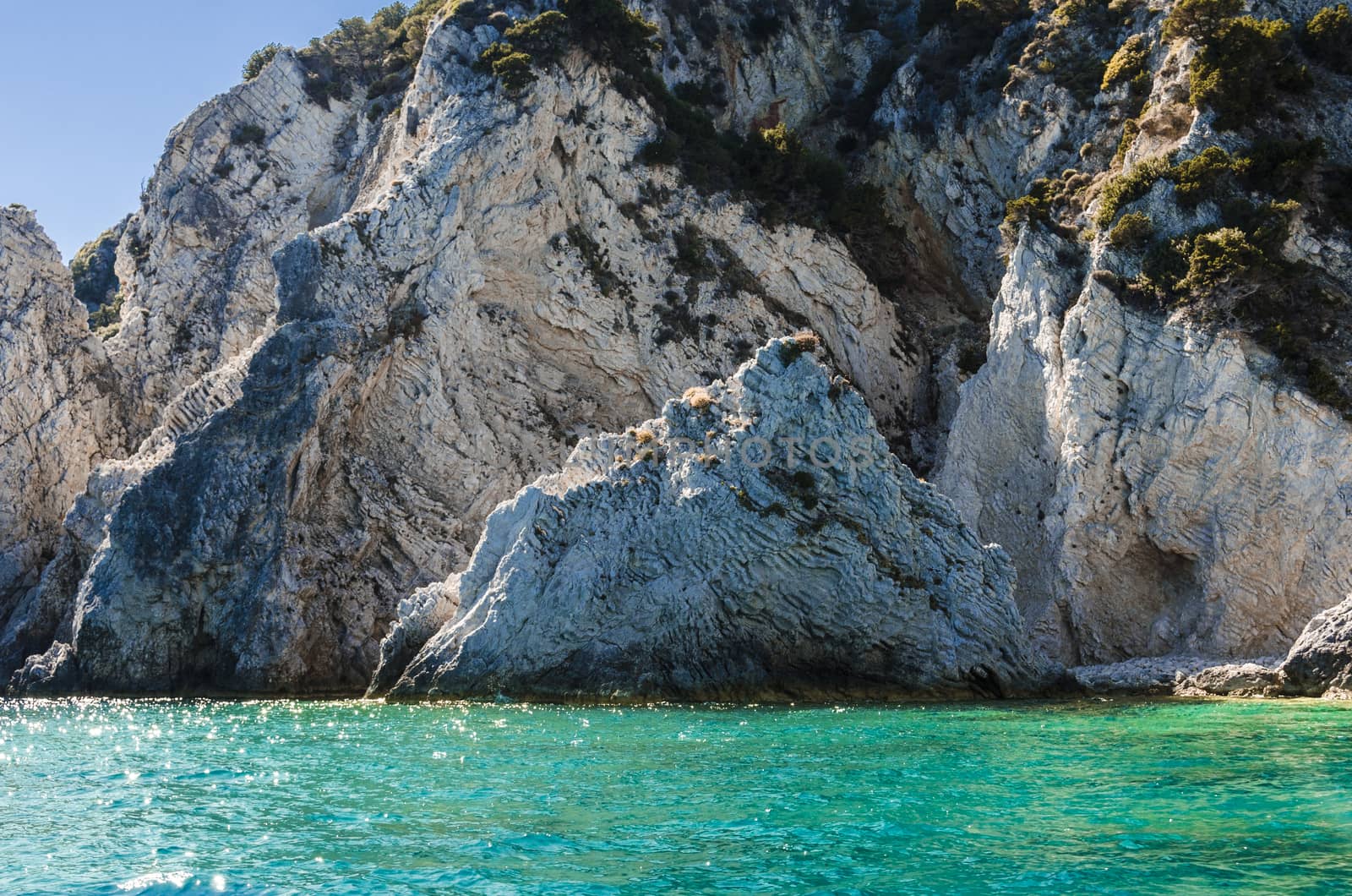 rock formation with rugged surface on the shores of the island of zakynthos in the Ionian sea
