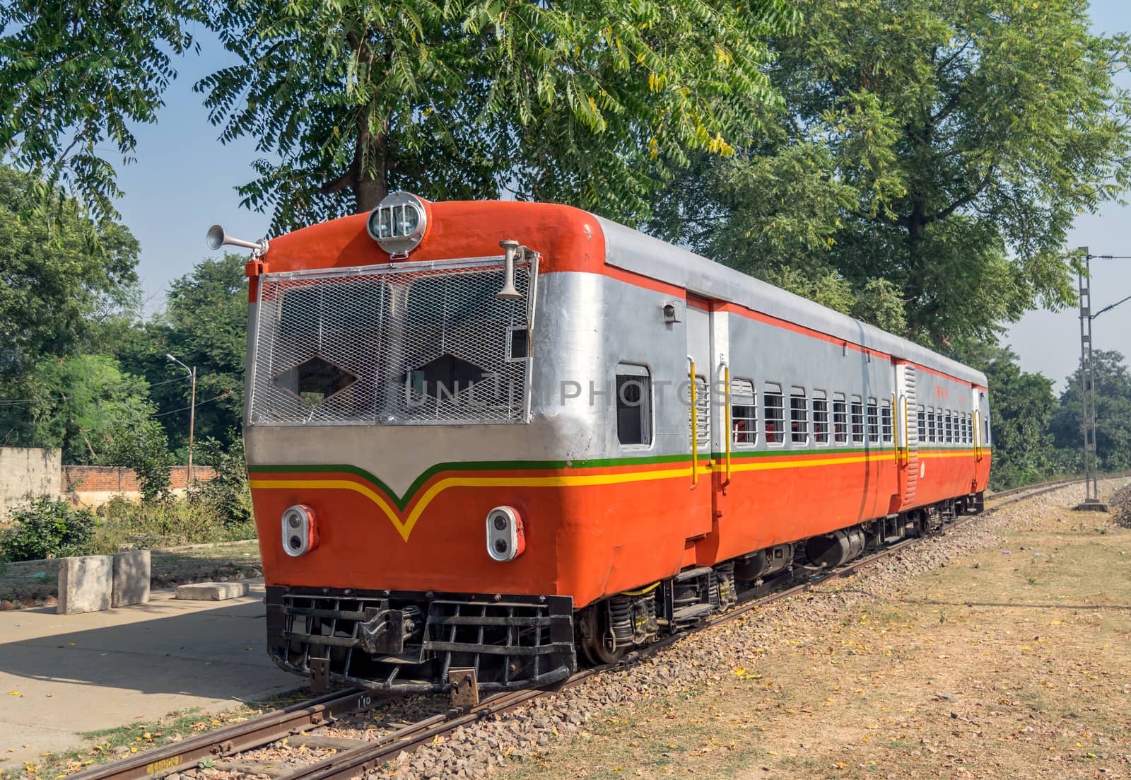 Brightly painted , Indian Railway's rail bus or rail motor operating between Mathura and Vrindavan, Uttar Pradesh, India.