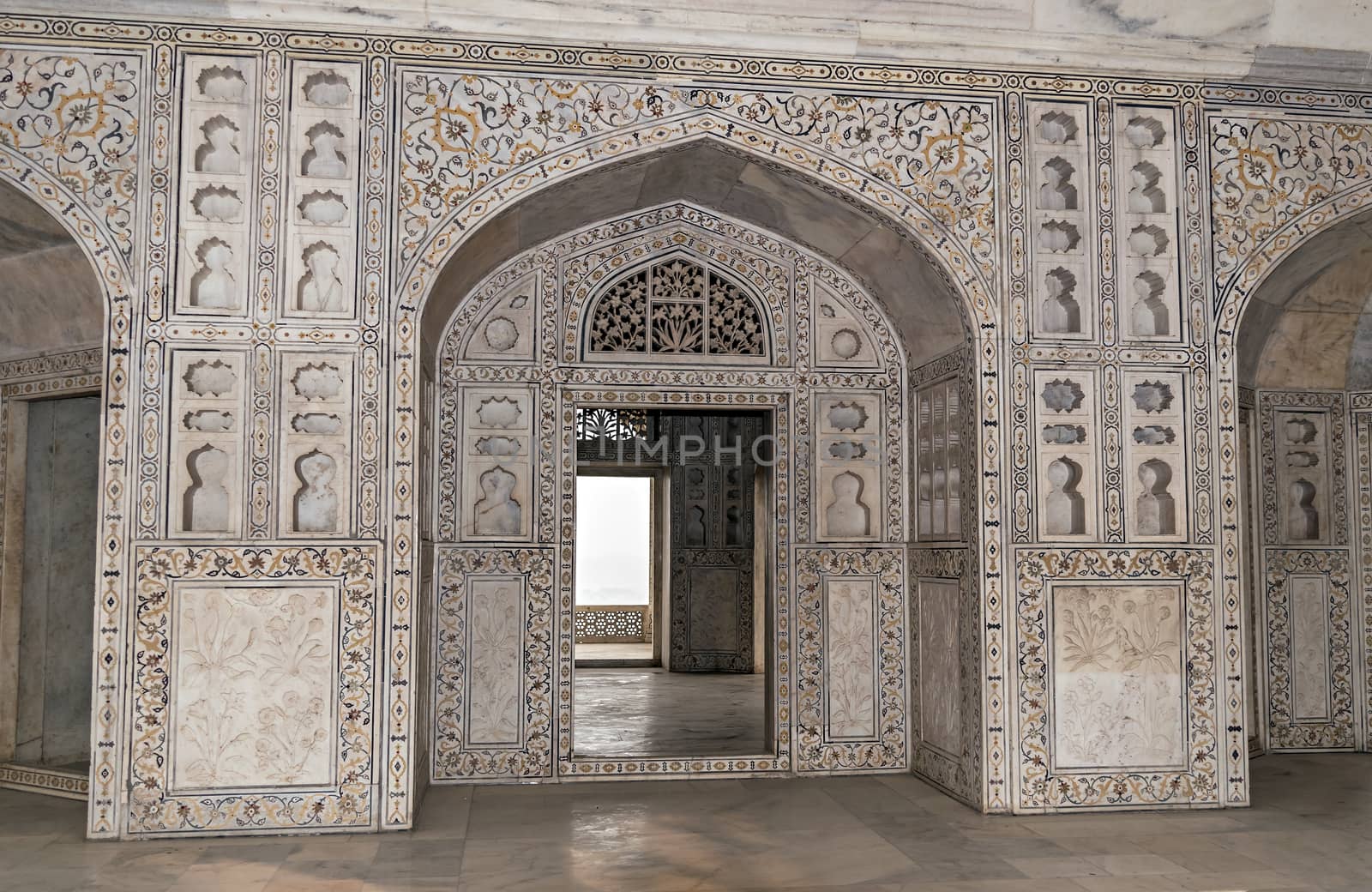 Exquisite carvings on entrance door of Red Fort in Agra, Uttar Pradesh, India. by lalam