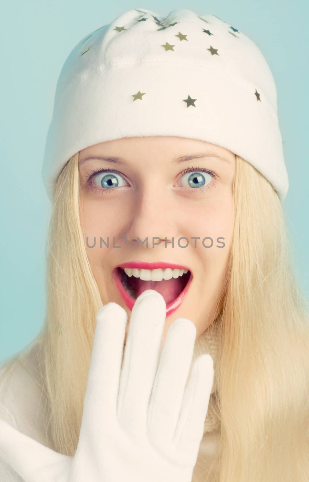 Happy blonde girl in Christmas time, woman with positive emotion in winter season for shopping sale and holiday brand by Anneleven