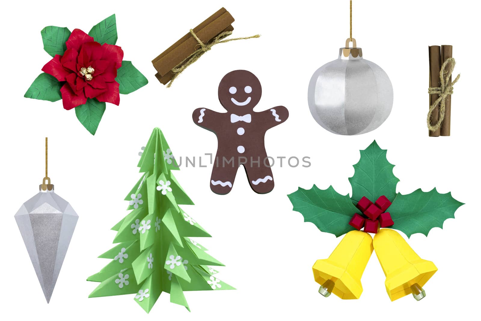 Set of paper Christmas and New Year decor isolated on white background. Paper art and craft. Handmade real paper objects. Paper Christmas tree, toys, poinsettia, bells, gingerbread man, cinnamon