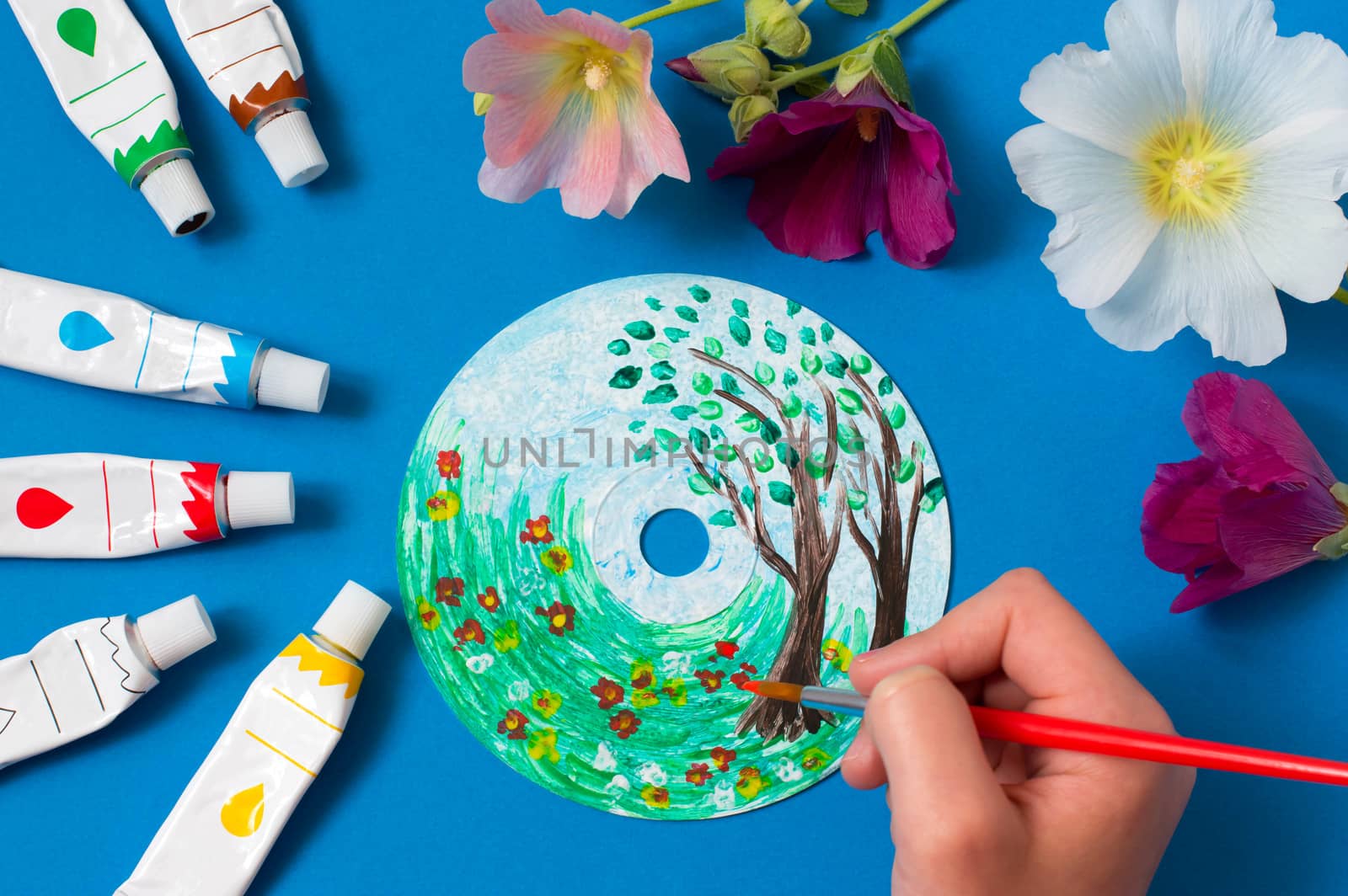 Painting with acrylics paints on CD. Seasons. Summer landscape. Creative art project 