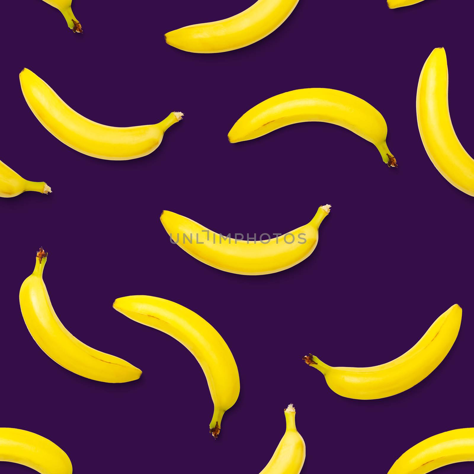 Bananas seamless pattern. pop art bananas pattern. Tropical abstract background with banana. Colorful fruit pattern of yellow banana on purple background, flat lay