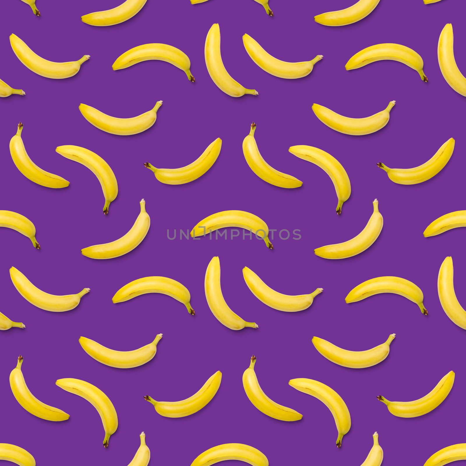 Bananas seamless pattern. pop art bananas pattern. Tropical abstract background with banana. Colorful fruit pattern of yellow banana on purple background, flat lay