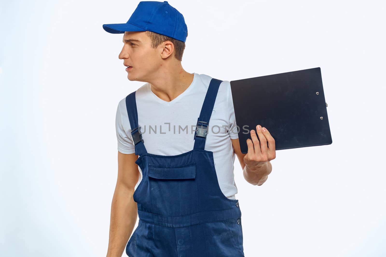 Working man in uniform documents delivery service courier. High quality photo