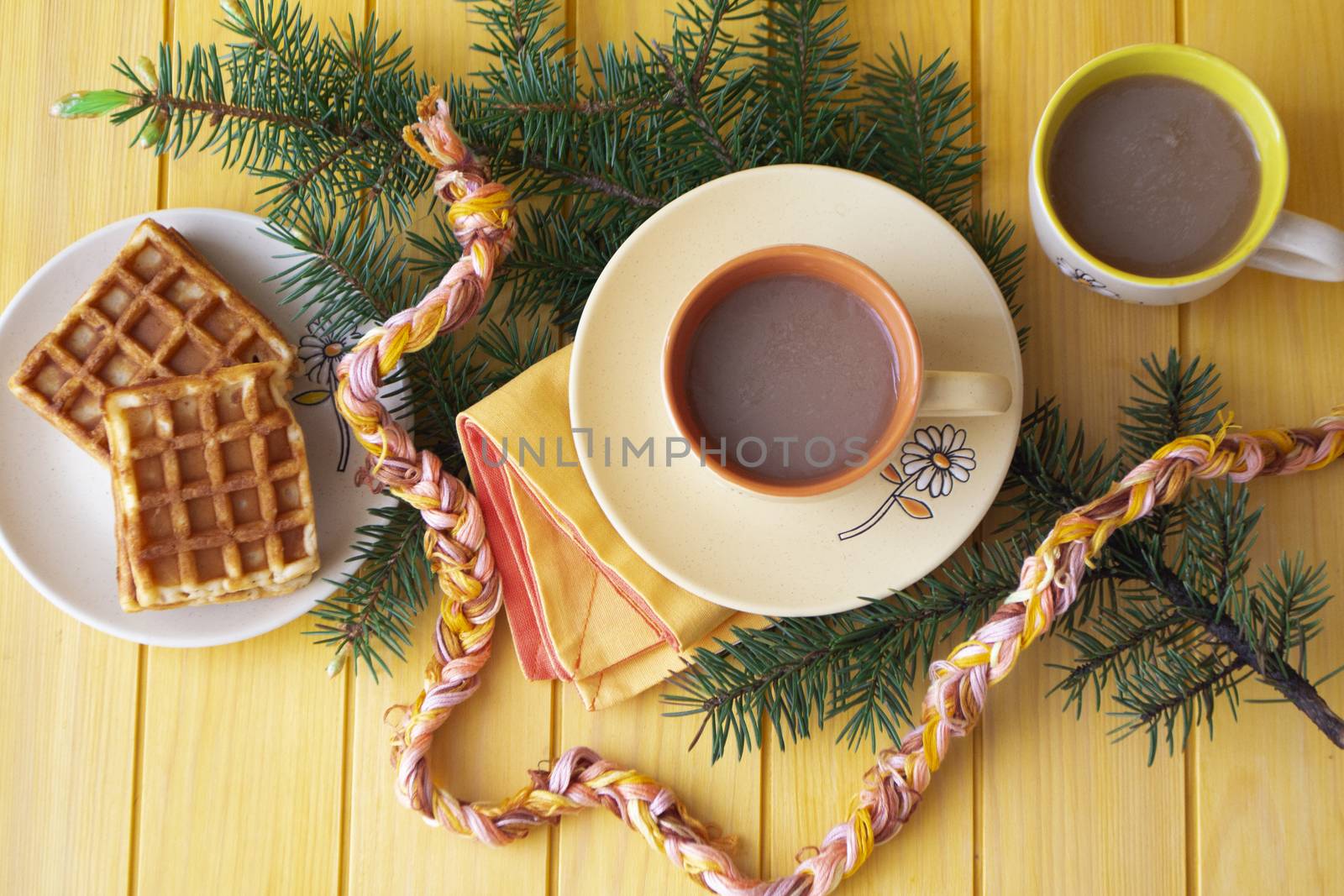 cups of hot cacao with belgian waffels, christmas hugge cozy home flat lay