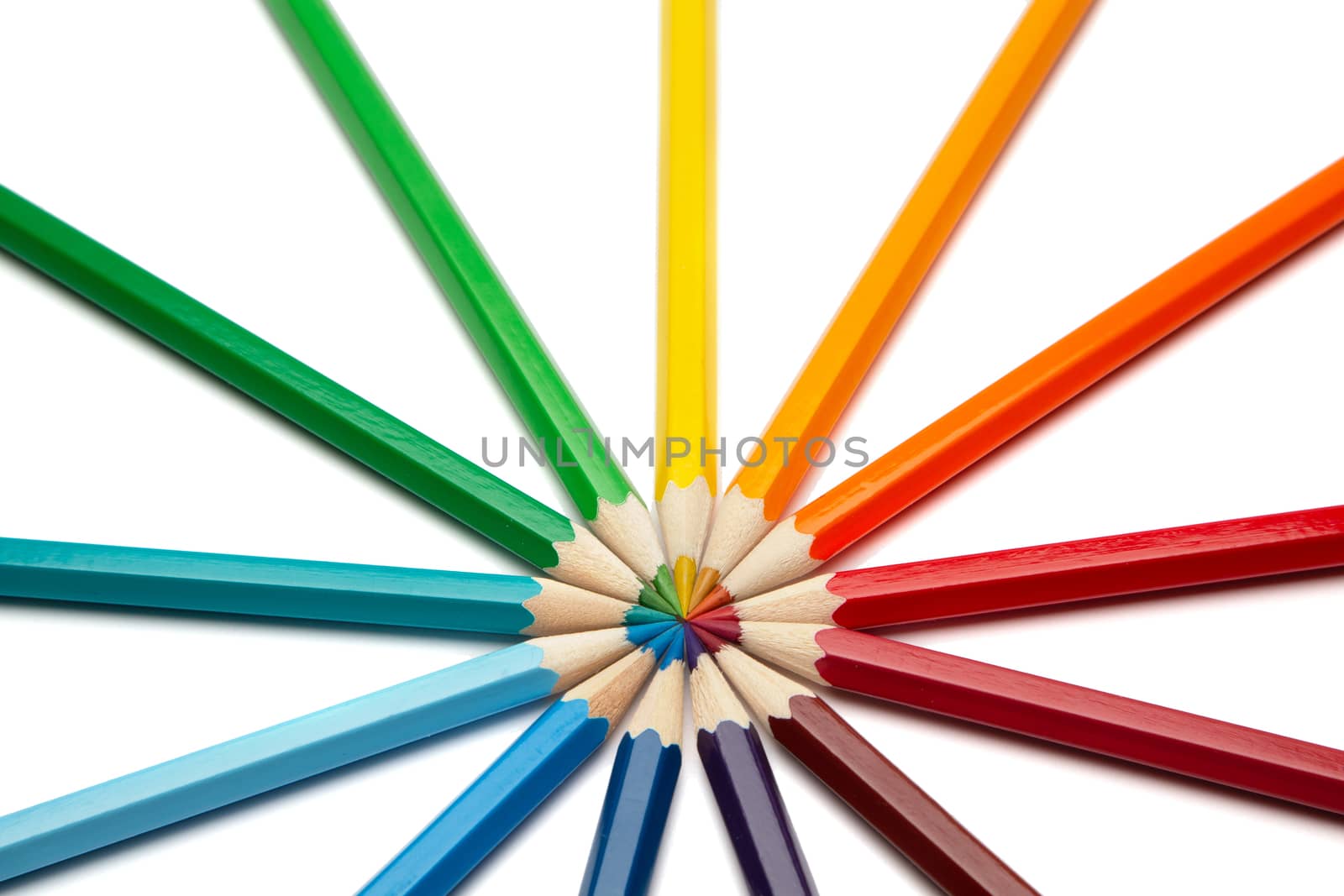 Lot of colorful wooden pencils on a white background