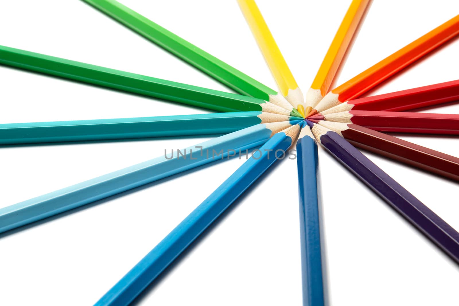 A lot of colorful wooden pencils on a white background by 25ehaag6