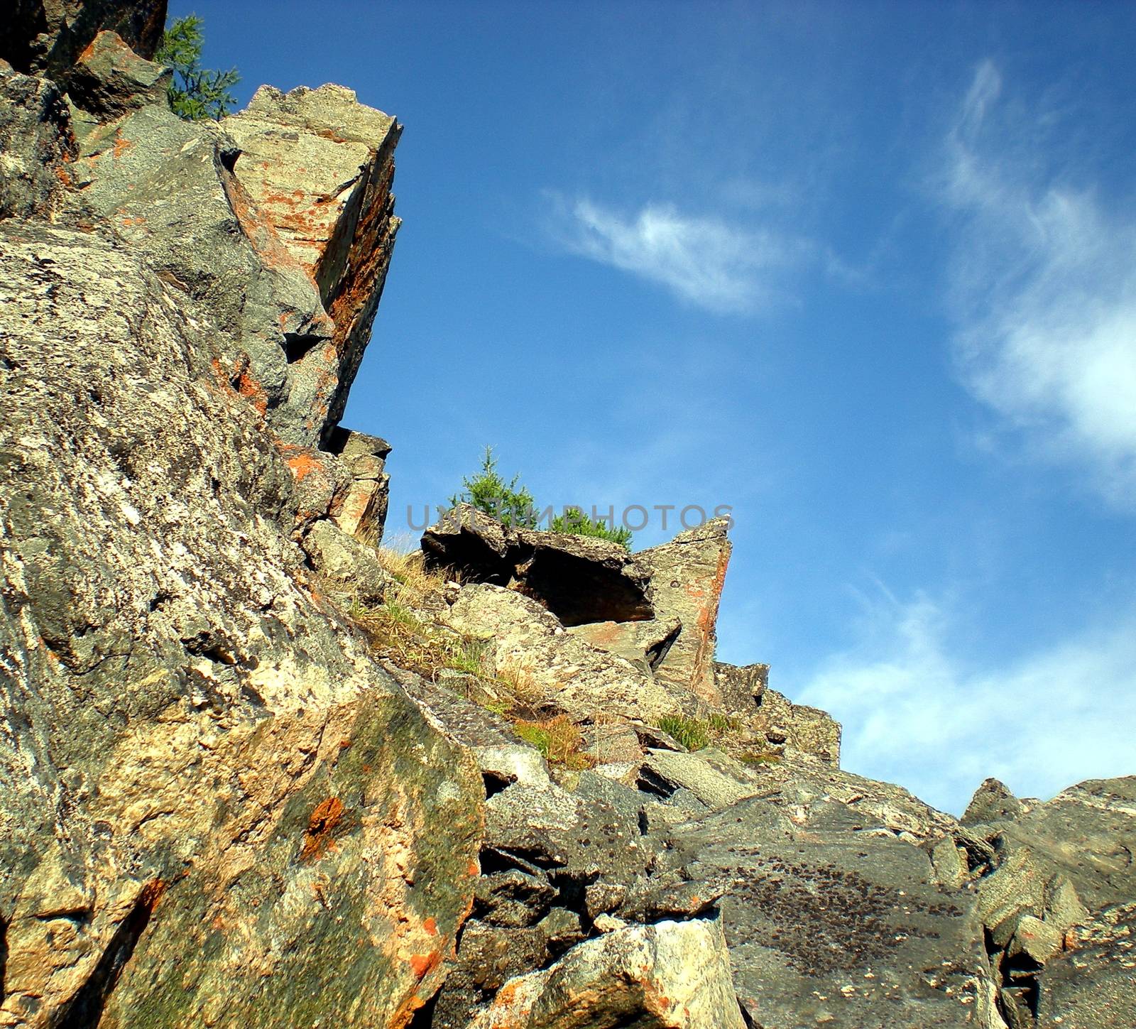 Rocks in the taiga in the Russian north. Exit to the surface of granites and basalts.