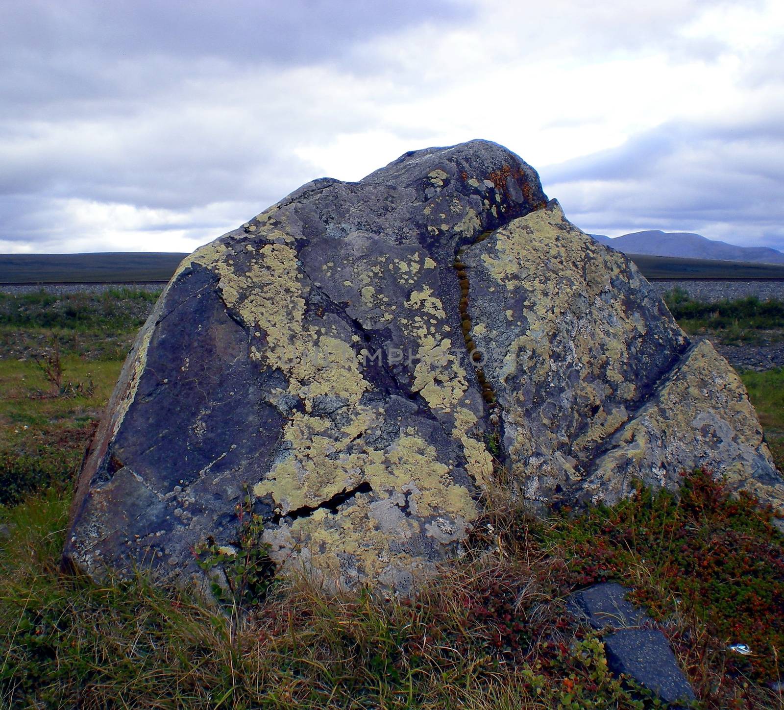 Rocks in the taiga in the Russian north. Exit to the surface of granites and basalts.