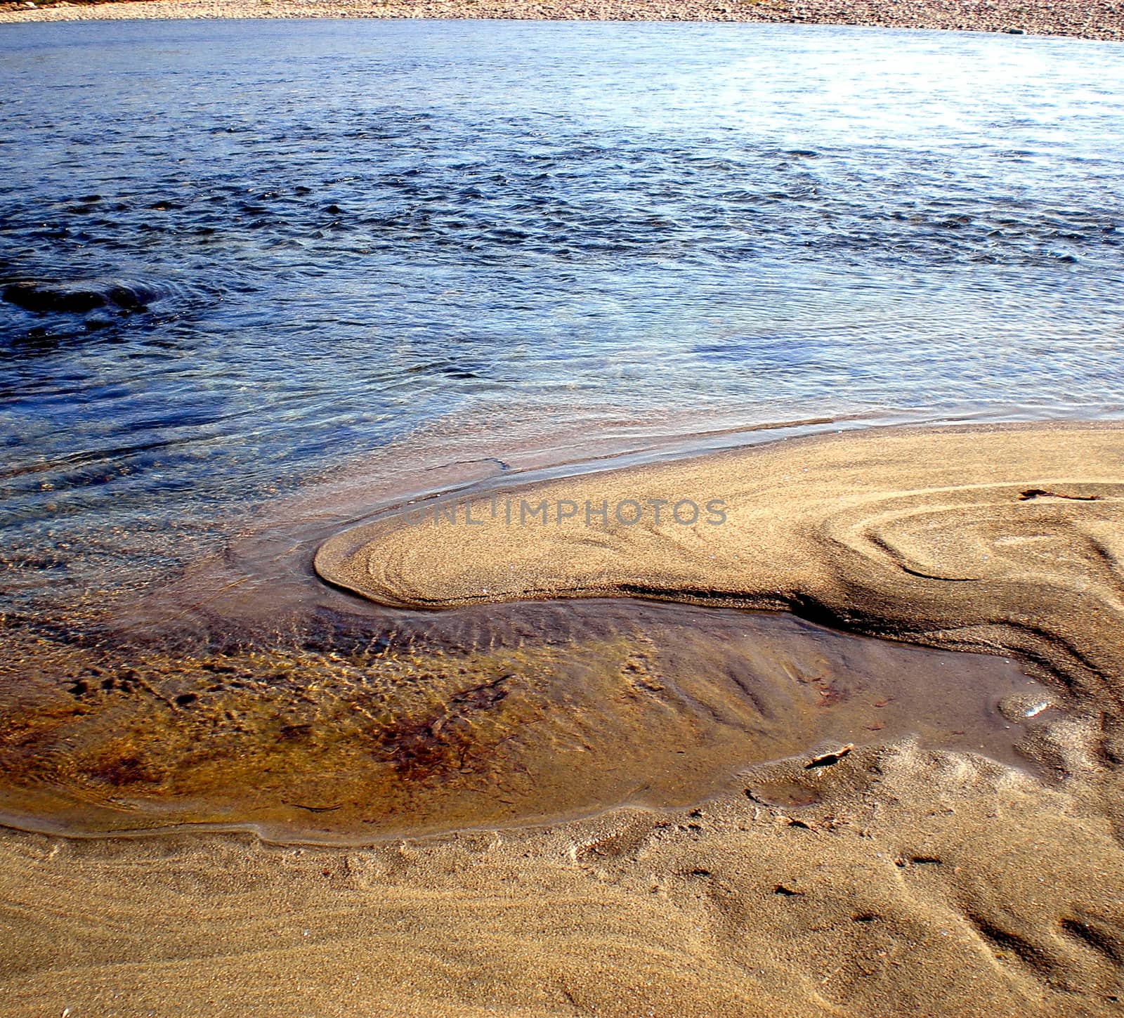The sandy shore of the northern Siberian river.