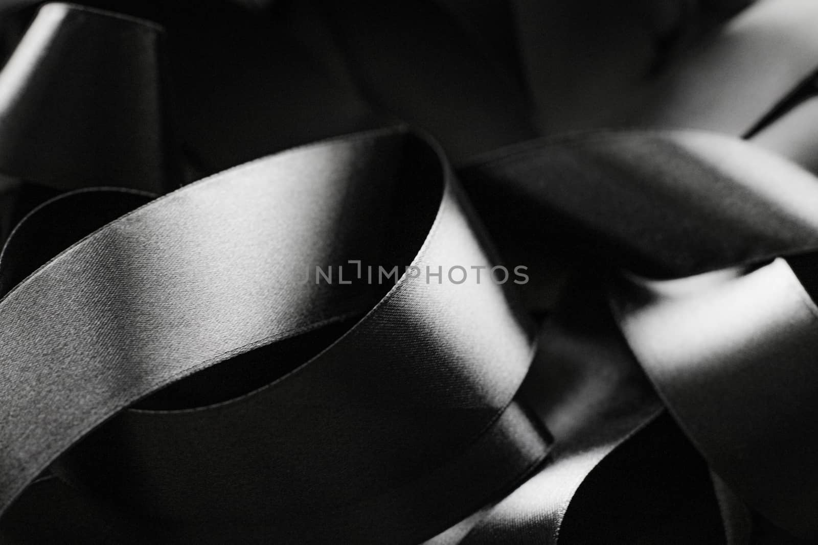 Black and white silk ribbon as background, abstract and luxury brand designs