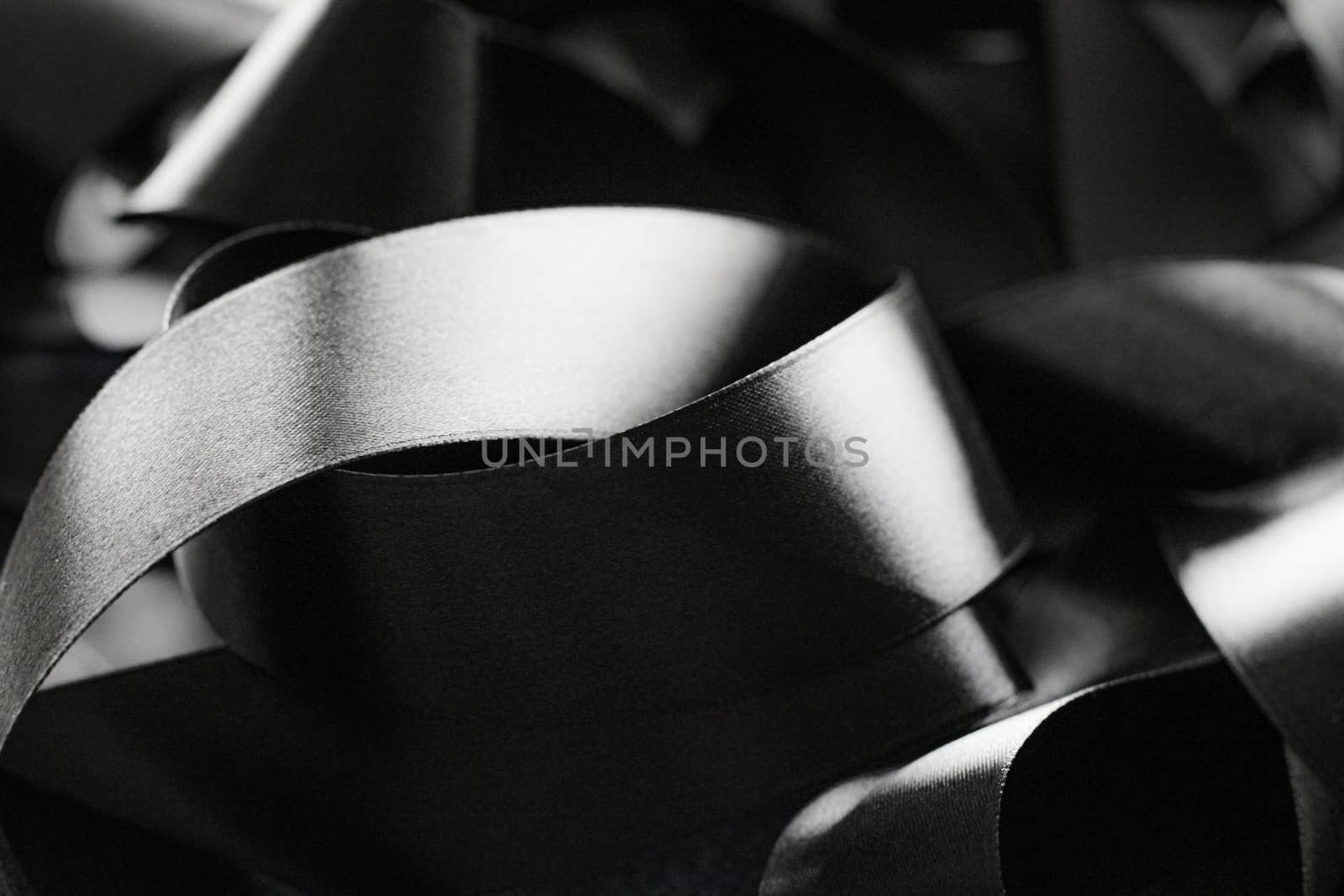 Black and white silk ribbon as background, abstract and luxury b by Anneleven