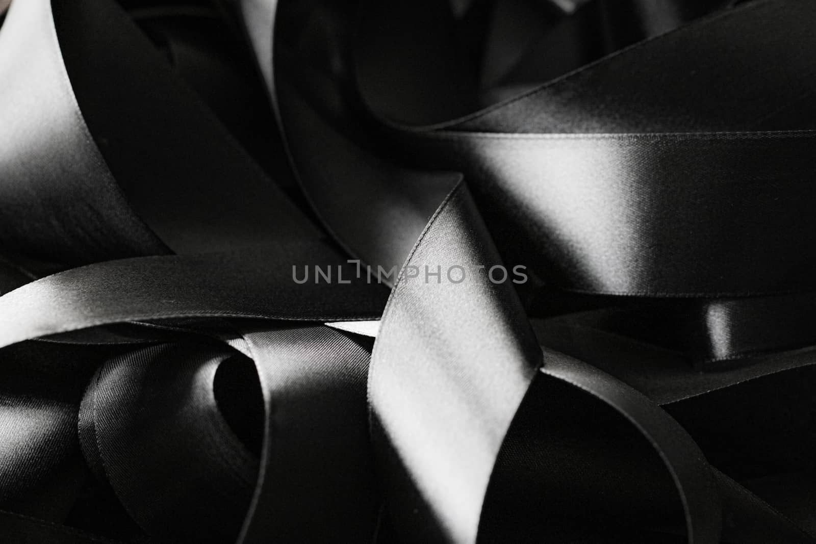 Black and white silk ribbon as background, abstract and luxury b by Anneleven