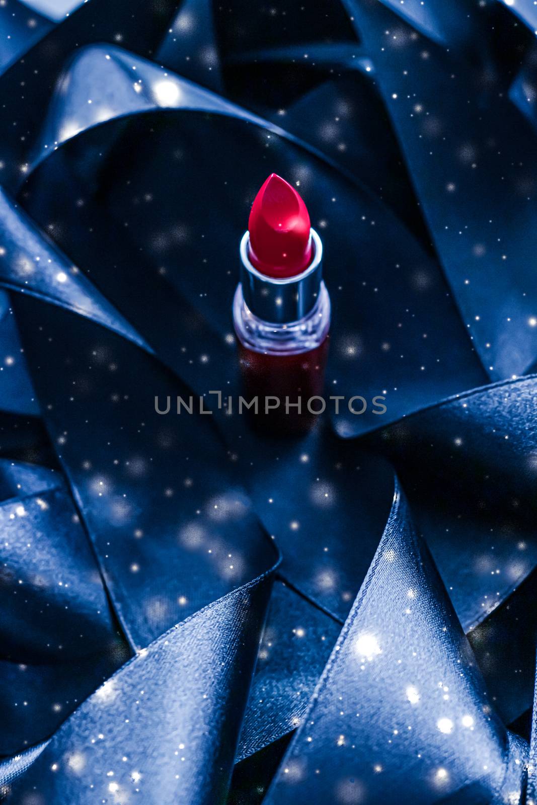 Red lipstick on blue silk and shiny glitter background, luxury m by Anneleven