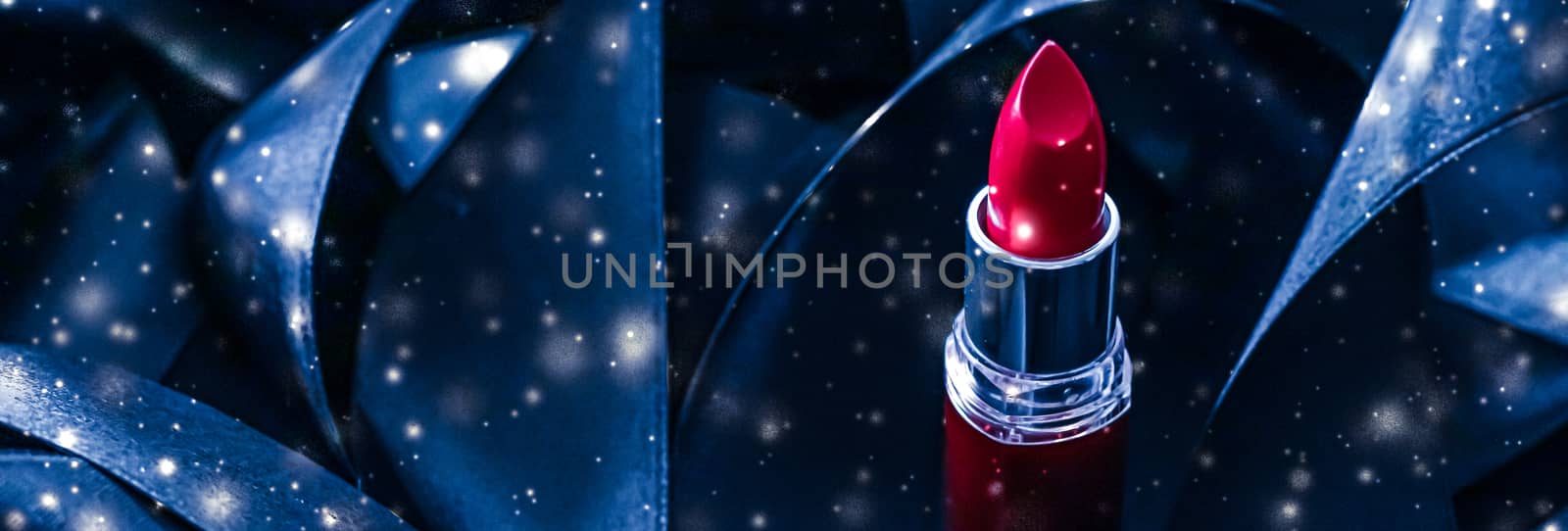 Red lipstick on blue silk and shiny glitter background, luxury m by Anneleven