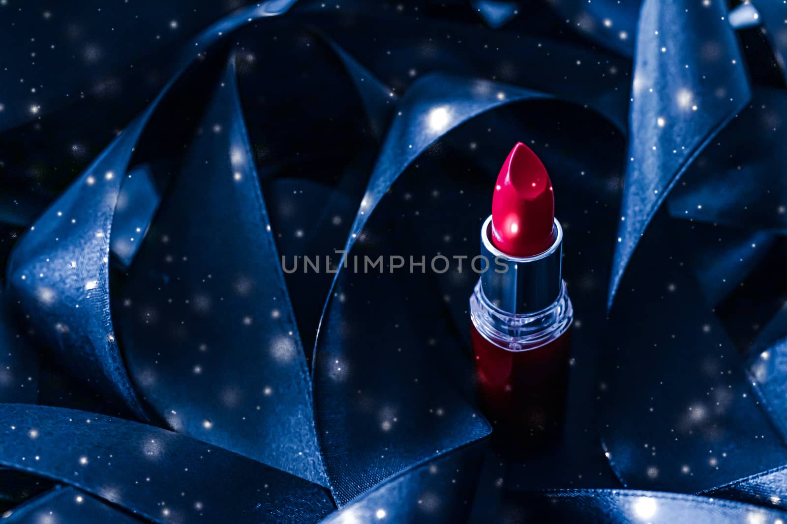 Red lipstick on blue silk and shiny glitter background, luxury m by Anneleven