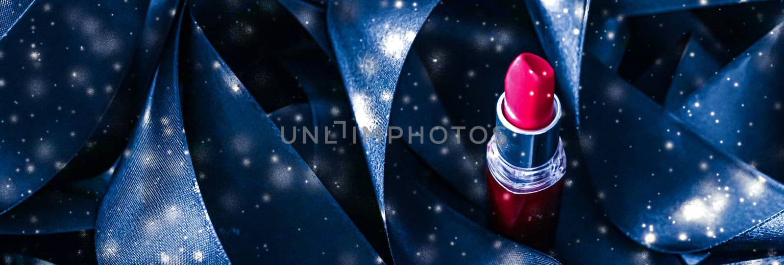 Red lipstick on blue silk and shiny glitter background, luxury m by Anneleven
