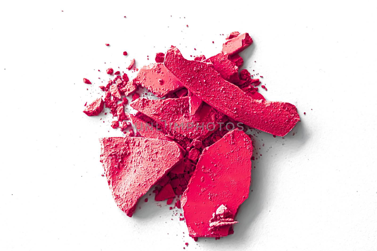 Pink eye shadow powder as makeup palette closeup isolated on white background, crushed cosmetics and beauty textures