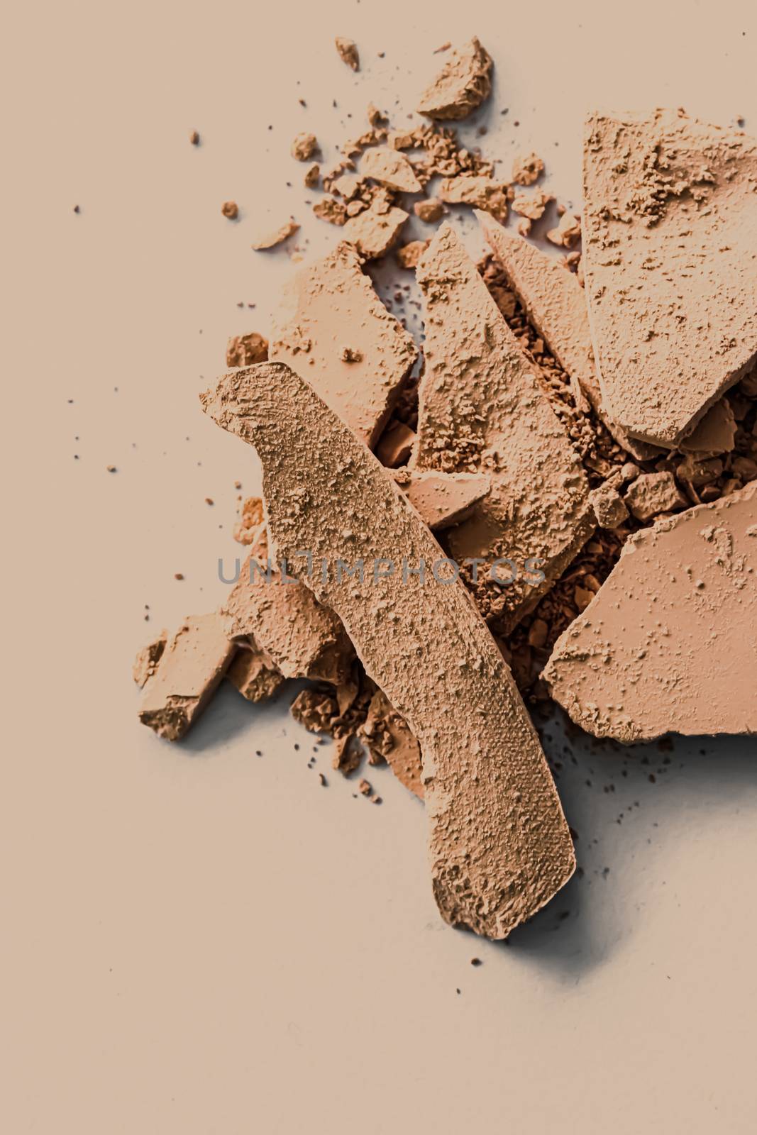 Beige eye shadow powder as makeup palette closeup, crushed cosmetics and beauty textures