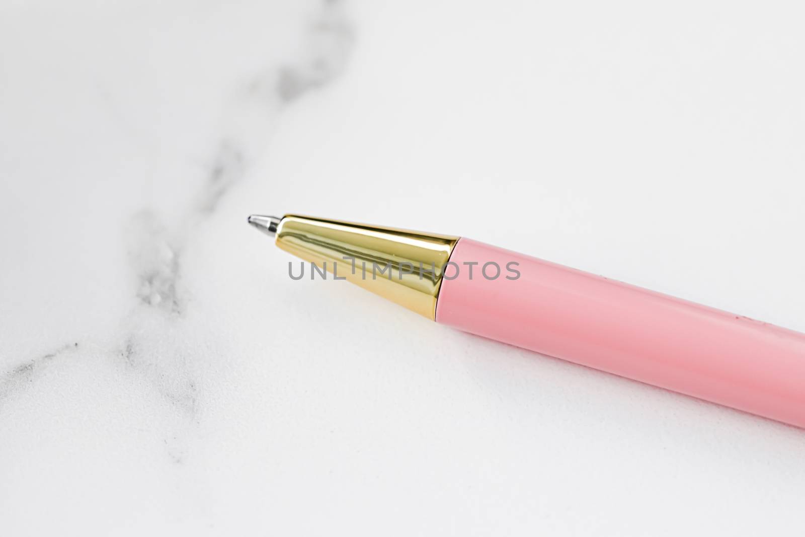Pink pen on marble background, luxury stationery and business br by Anneleven