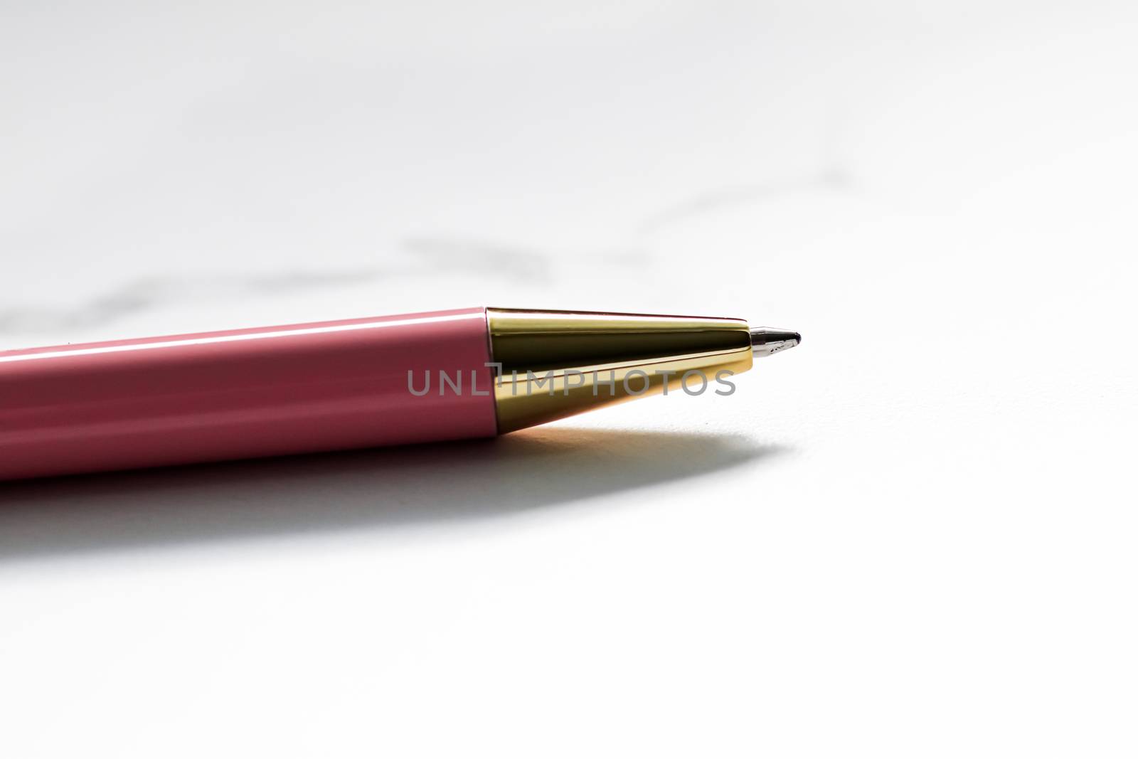 Pink pen on marble background, luxury stationery and business br by Anneleven