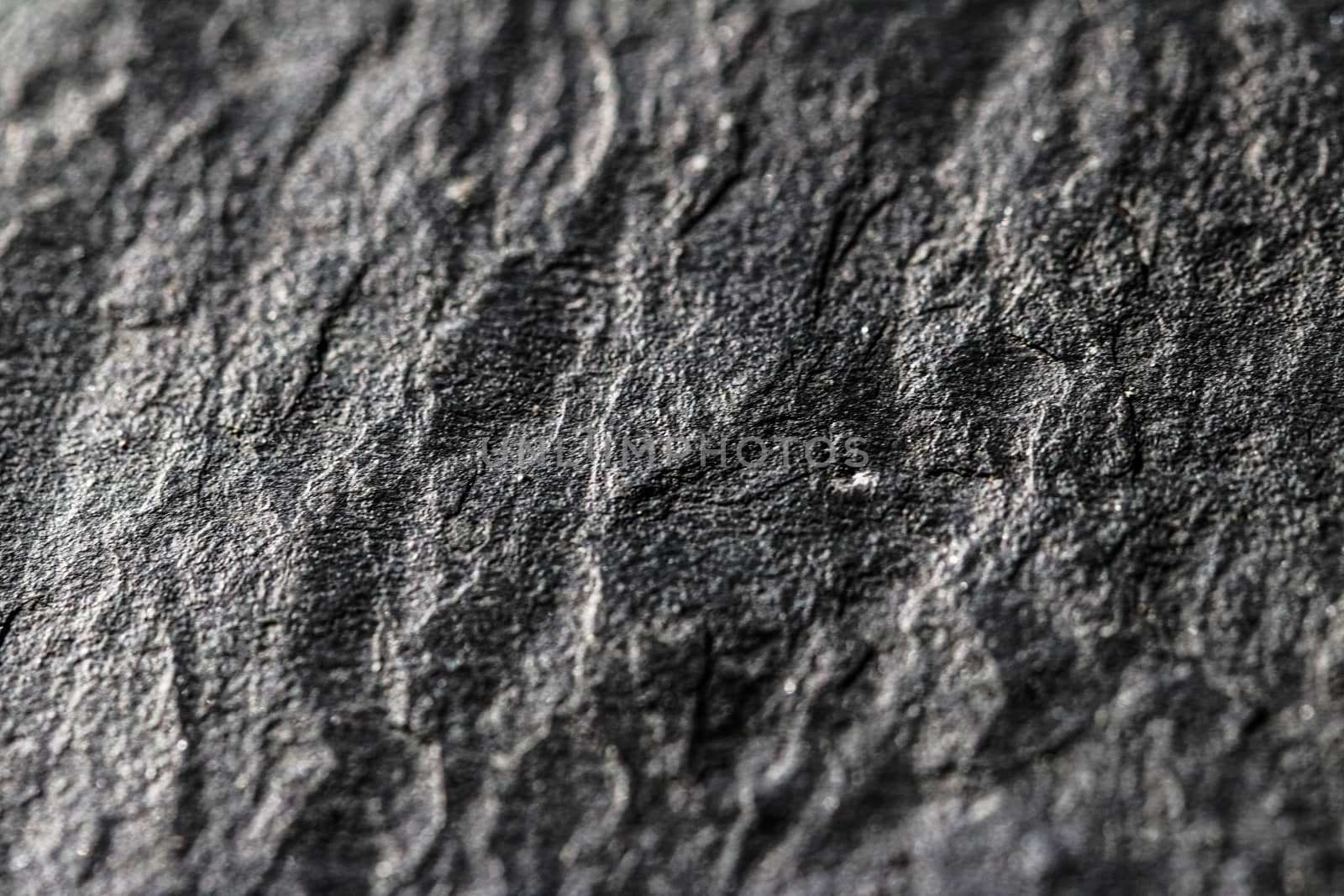 Gray stone texture as abstract background, design material and textured surfaces