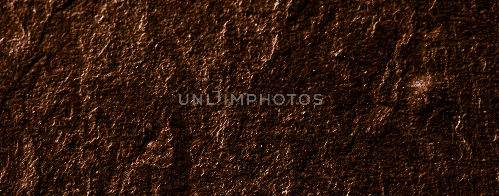 Brown stone texture as abstract background, design material and textured surfaces