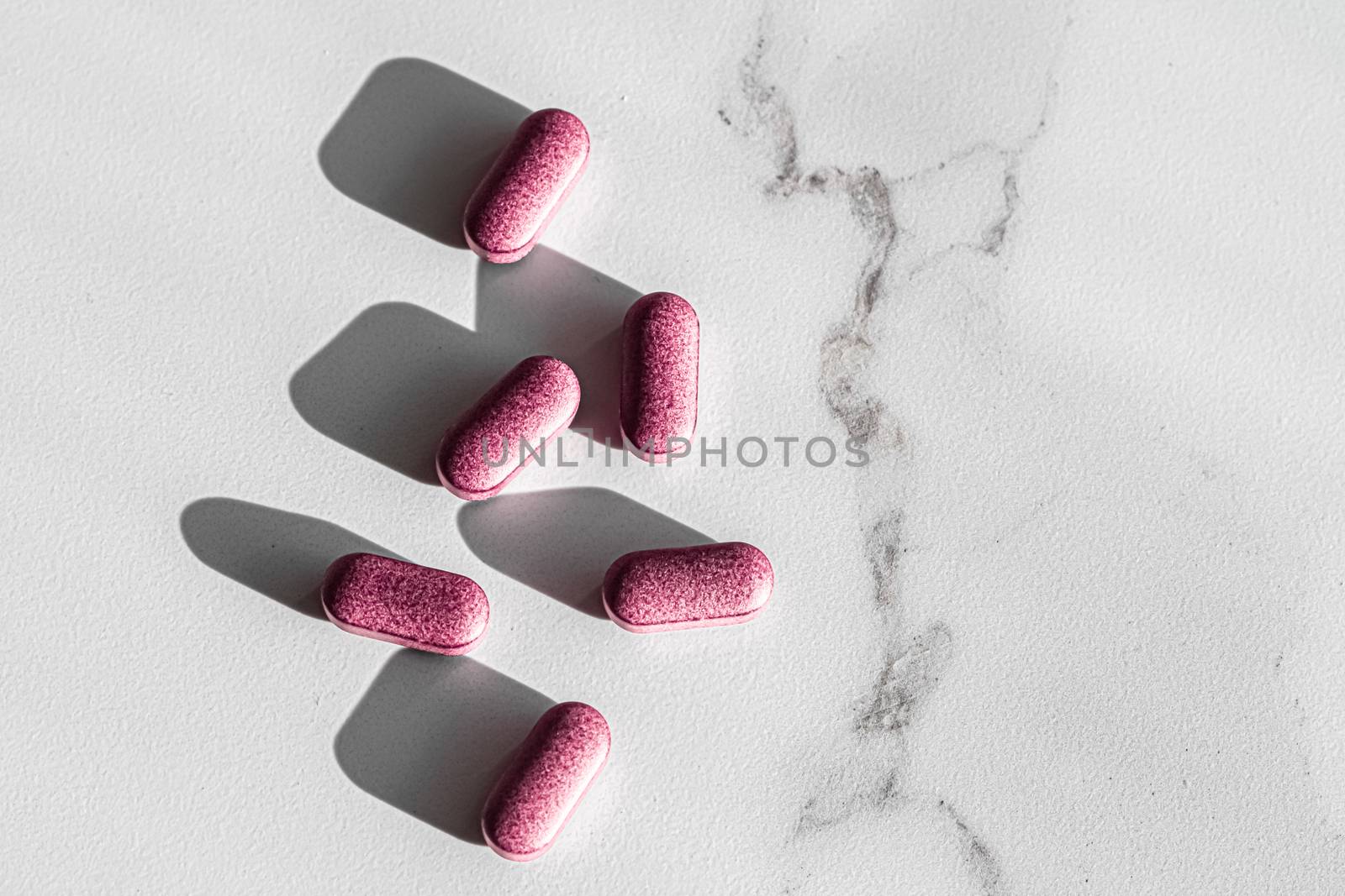 Pink pills as herbal medication, pharma brand store, probiotic drugs as nutrition healthcare or diet supplement products for pharmaceutical industry ads