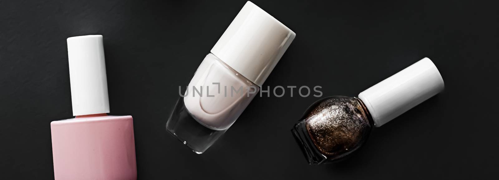 Nail polish bottles on black background, beauty brand by Anneleven