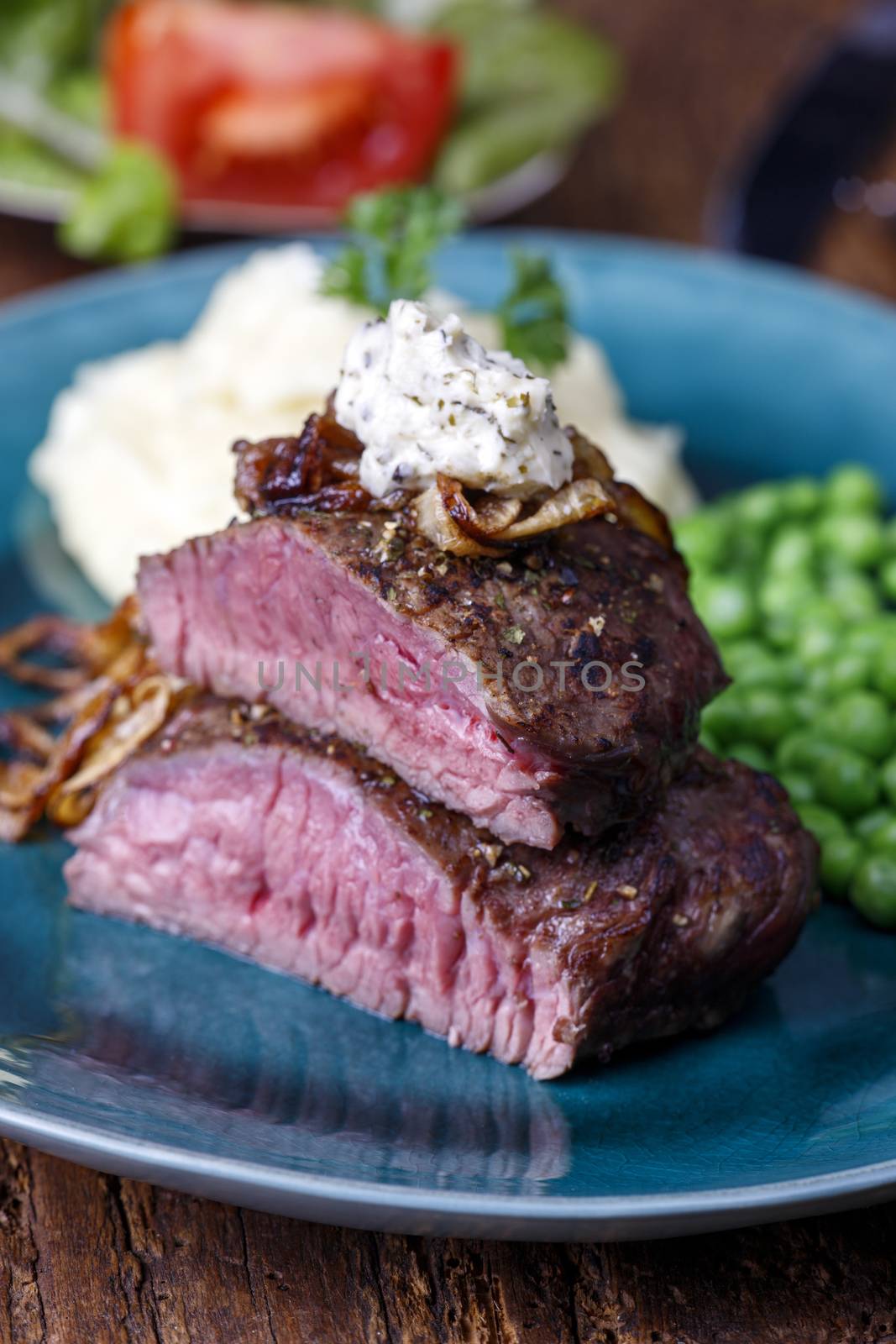 grilled steak with roasted onions